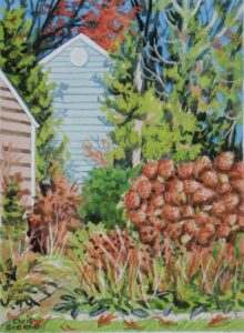 Autumn garden beside pale blue house