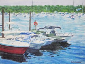 Boats docked in a calm marina