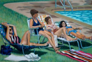 Four women relaxing by a pool.