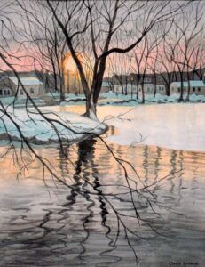 Bare trees reflecting on river at sunset