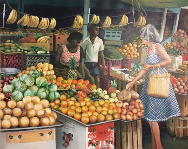 Woman shopping for fruit at a market.