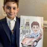 Boy holding a Times Square caricature.